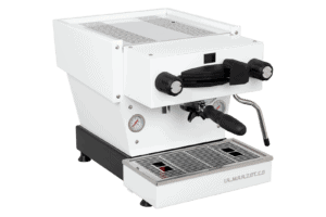 Badger and Dodo Coffee Roasters: The La Marzocco Linea Mini - Bianca espresso machine includes a steam wand, portafilter, and front-facing pressure gauges. Its stainless steel drip tray and stylish black base offer both elegance and functionality for the perfect coffee experience.