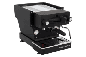 Badger and Dodo Coffee Roasters: The La Marzocco Linea Mini - Nera espresso machine boasts dual gauges, a portafilter, and a side steam wand. La Marzocco is etched on the base. Its sleek, compact design is ideal for personal use or small cafes.