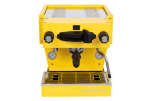 Badger and Dodo Coffee Roasters: The La Marzocco Linea Mini - Yellow espresso machine stands out with its two black dials, centered portafilter, pressure gauges, right-side steam wand, and drip tray. A metallic top and compact design make it ideal for any kitchen.