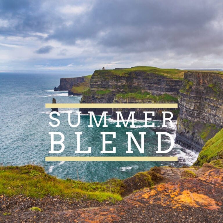 Blog 12 Badger & Dodo. Cliffs by the ocean beneath a cloudy sky, featuring the text “Summer Blend” to capture the refreshing essence of this product.