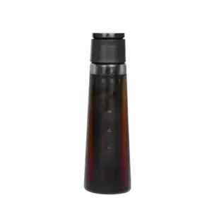 A black cold brew coffee maker with a cylindrical shape, featuring a transparent lower body and a built-in vertical filter visible inside. The top is capped with a matte black lid.