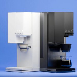 Two XBloom coffee machines side by side, one in sleek white and the other in matte black, displayed against a blue background with a glass carafe placed under the black machine.