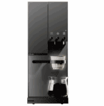 A sleek, modern black coffee machine with a digital control panel and three knobs. The machine has a filter holder containing a white dripper and a glass carafe filled with coffee positioned underneath.