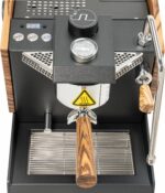 A modern, high-end espresso machine with a black metal body, chrome brew group, and wooden side panels and handles. It features a portafilter, a steam wand, and a minimalist front panel with the Nurri logo.