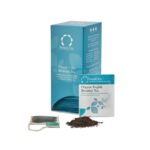 Teal box of Solaris Organic Breakfast Tea with leaf pattern, shown with a matching tea sachet, loose black tea leaves, and a small tea bag in front on a white background.