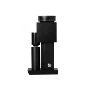 A minimalist black tabletop grinder with a cylindrical top dial, a rectangular central body, and a smaller vertical cylinder on the side, all mounted on a rectangular base against a light gray background.