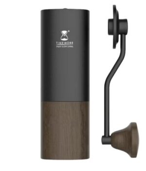 Black and wood Timemore manual coffee grinder with a side-mounted crank handle, shown against a white background.
